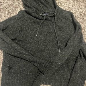 Women’s sweater with slights rips
